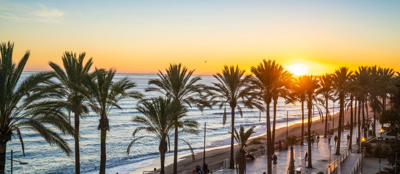 Marbella district comparison showing Puerto Banús marina lifestyle, Golden Mile beachfront living, and Nueva Andalucía golf villa setting